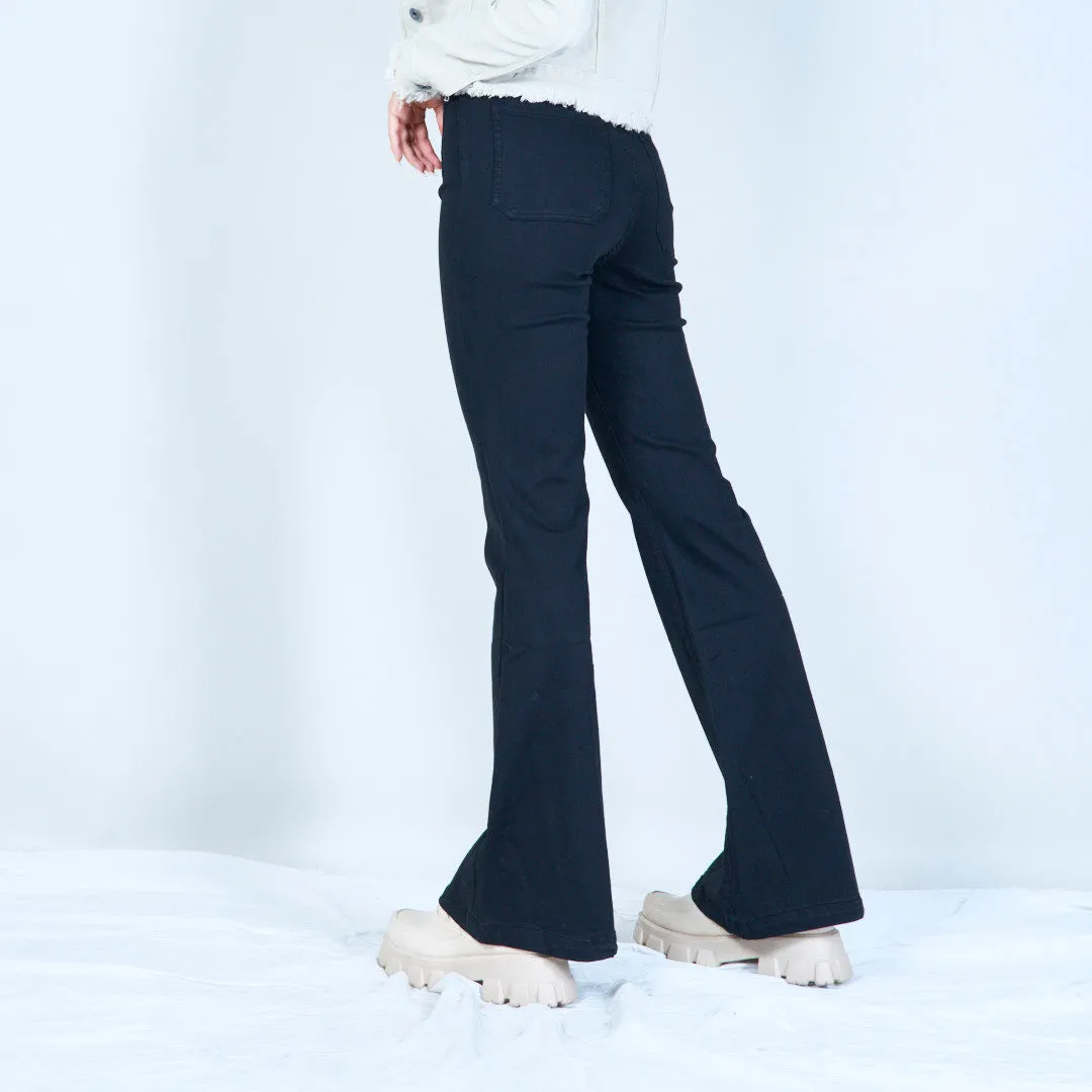 Flared white denim jeans with front pockets wholesale